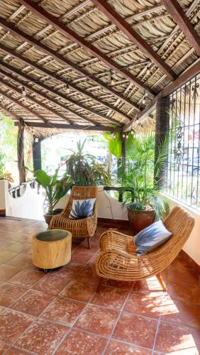 Ein Sitzbereich in der Unterkunft Esencia Puerto Escondido