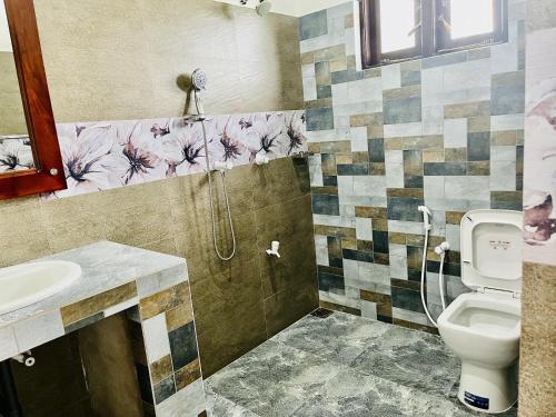 Koupelna v ubytování Aura Villa
