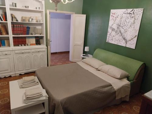 Postel nebo postele na pokoji v ubytování La casetta colorata