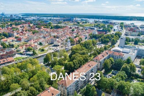 an aerial view of a city with the words dances at Danės23 - CANDY studio, Self Check-in, Free Parking, Park and River View, Oldtown, A/C in Klaipėda