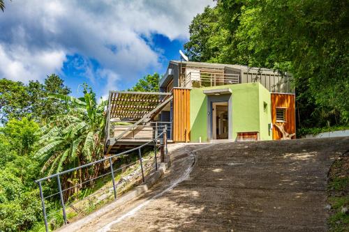 a house on the side of a road at Les Cabanes Perchées in Bouillante