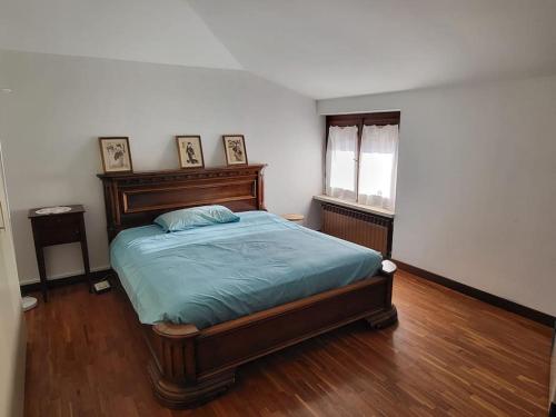 En eller flere senge i et værelse på Sentirsi a casa