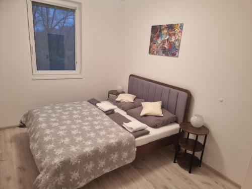 Postel nebo postele na pokoji v ubytování Konig Mikulov