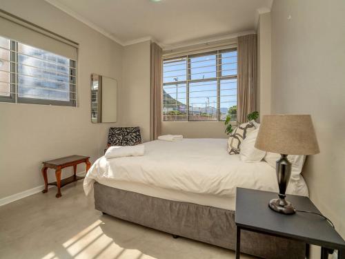 Ένα ή περισσότερα κρεβάτια σε δωμάτιο στο Beachfront apartment