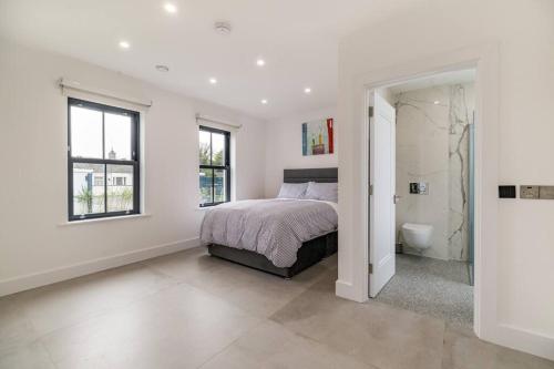 Ένα ή περισσότερα κρεβάτια σε δωμάτιο στο Red Sheds Villa Portarlington