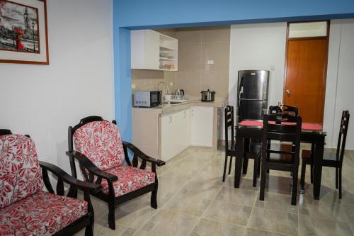 Una cocina o cocineta en Suite and Business