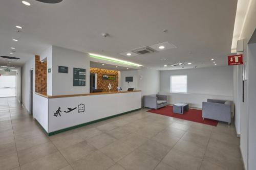 Фотография из галереи City Express Junior by Marriott Puebla Angelopolis в городе Пуэбла