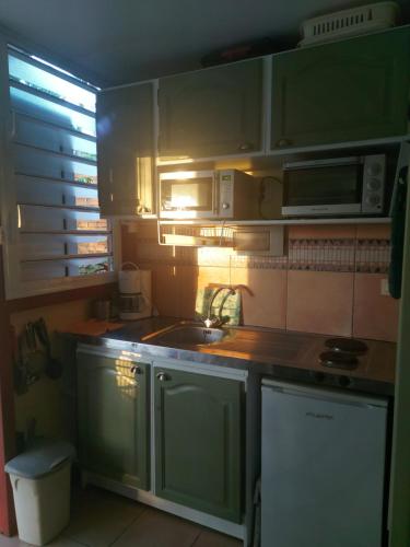 Η κουζίνα ή μικρή κουζίνα στο Appartements Residence Mahoghany