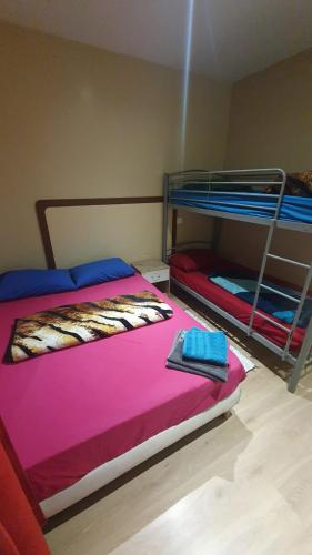Ένα ή περισσότερα κρεβάτια σε δωμάτιο στο Hotel le Privilege