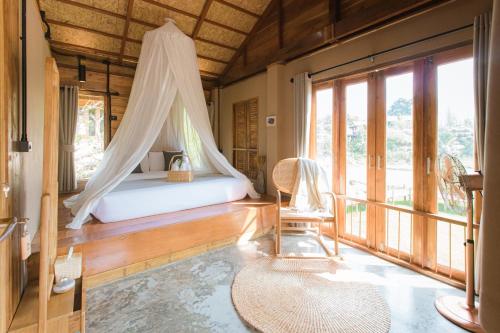 Postel nebo postele na pokoji v ubytování Kod Sapan Resort, Nan