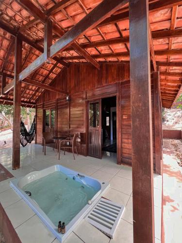 a hot tub in the middle of a house at Verde Mar Pipa Beach in Pipa