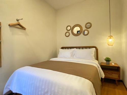 Ένα ή περισσότερα κρεβάτια σε δωμάτιο στο Kallea Villas