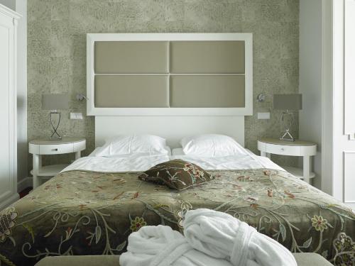 Ein Bett oder Betten in einem Zimmer der Unterkunft Romantik Parkhotel het Gulpdal