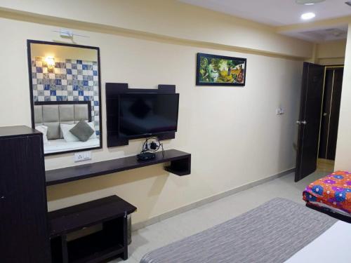 TV a/nebo společenská místnost v ubytování HOTEL DREAM INN