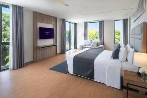 Ένα ή περισσότερα κρεβάτια σε δωμάτιο στο Canalis Suvarnabhumi Airport Hotel