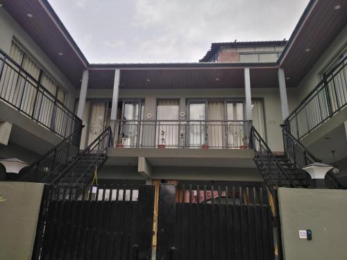 an image of a building with stairs in front at NHC full cottage in Nandi