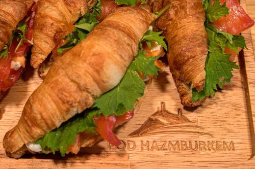 a group of croissants on a cutting board at Penzion pod Hazmburkem in Klapý