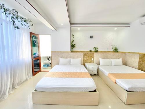 Giường trong phòng chung tại ZoZo House - Homestay Bai Sau