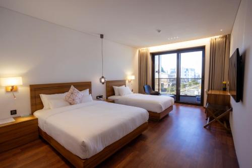 Luel Hotelにあるベッド