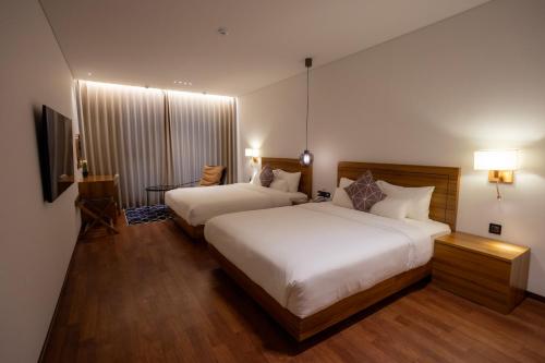 Luel Hotelにあるベッド