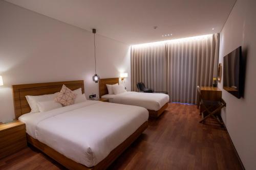 Luel Hotelにあるベッド
