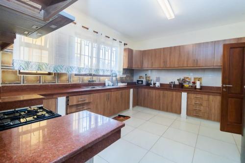 Køkken eller tekøkken på Acacia Bee 4 Bedroom