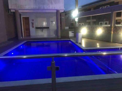 Der Swimmingpool an oder in der Nähe von Apartamento com piscina/3 min da Praia