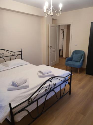 Postel nebo postele na pokoji v ubytování Bloom Apartament