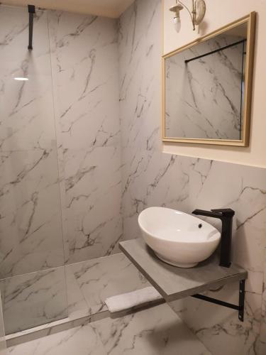 Ένα μπάνιο στο Bloom Apartament