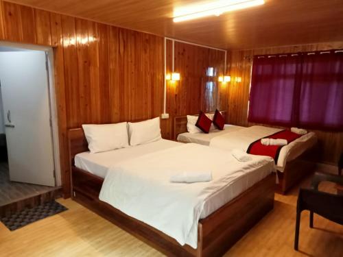 Himalayan Cloud's Homestayにあるベッド