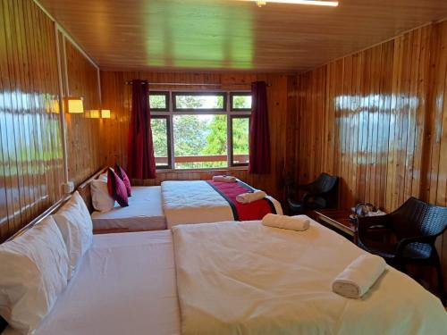 Himalayan Cloud's Homestayにあるベッド
