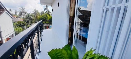 a view from the balcony of a building at Ivory Laze Hotel in Negombo