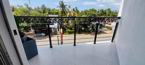 a balcony with a view of a street at Ivory Laze Hotel in Negombo