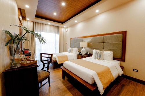 Postel nebo postele na pokoji v ubytování Highland Bali Villas, Resort and Spa