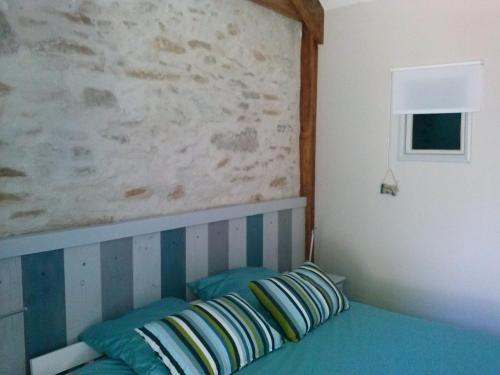 Postel nebo postele na pokoji v ubytování Chambre d'Hôtes le massanous