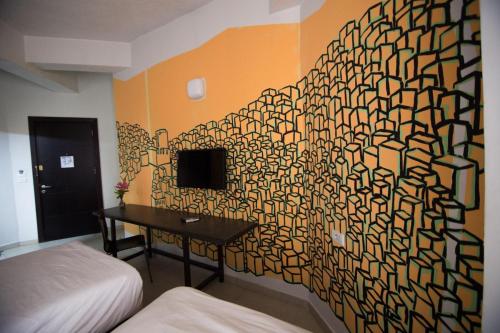 Televisyen dan/atau pusat hiburan di Art Hotel Downtown