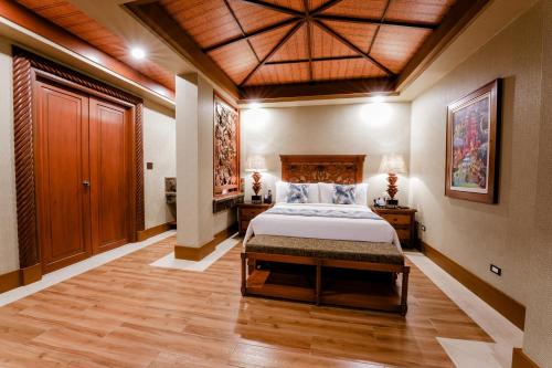 Postel nebo postele na pokoji v ubytování Highland Bali Villas, Resort and Spa