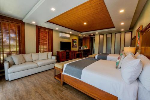 Postel nebo postele na pokoji v ubytování Highland Bali Villas, Resort and Spa