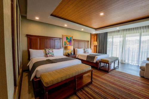Postel nebo postele na pokoji v ubytování Highland Bali Villas, Resort and Spa
