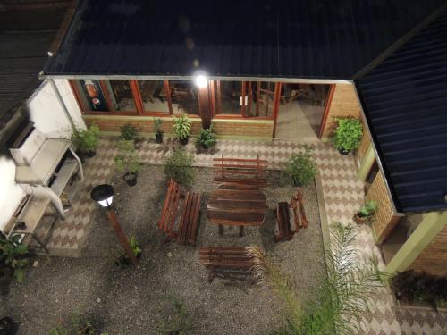 an overhead view of a patio with a table and chairs at Hotel Buenos Aires in Salta