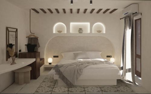 カマリにあるシェ ソフィーの白いベッドルーム(ベッド1台、シンク付)