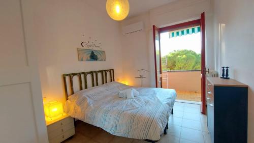 Posteľ alebo postele v izbe v ubytovaní Relax al Guardastelle - Free parking & Wi-Fi & Air condition