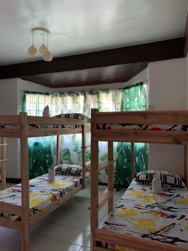 Letto o letti in una camera di Amancio's Balai - Near the Airport, City Center!