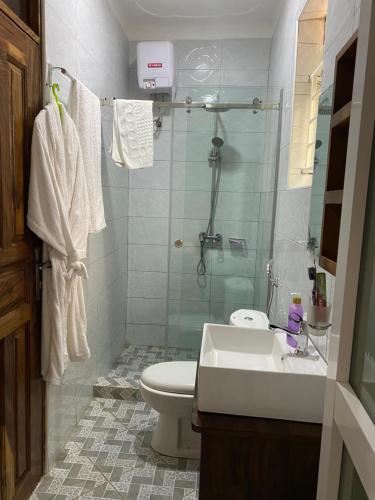 Een badkamer bij Adea Apartments Muyenga