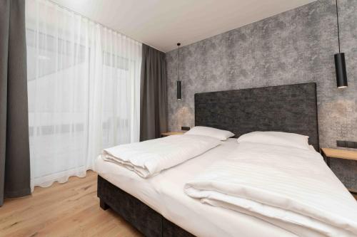 Cama o camas de una habitación en A CASA Serenity