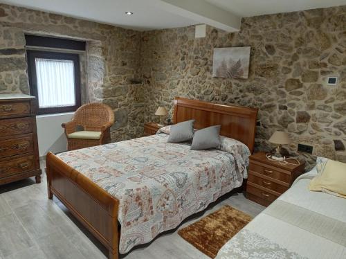 Ένα ή περισσότερα κρεβάτια σε δωμάτιο στο Casa Alberto