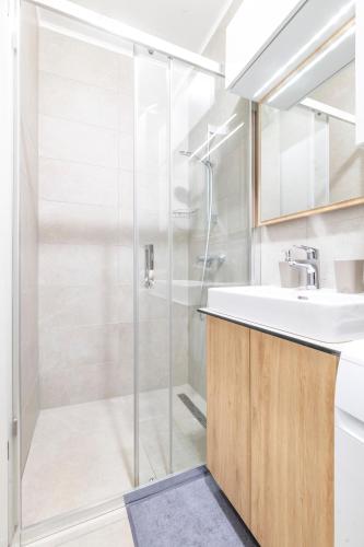 a bathroom with a shower and a sink at LILY apartment - Flexible SelfCheckins 48- Luxury- Extra big terrace with jacuzzi in Zagreb