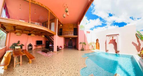 an indoor pool in a house with a swimming pool at Tiên Sơn Pleiku Homestay in Pleiku