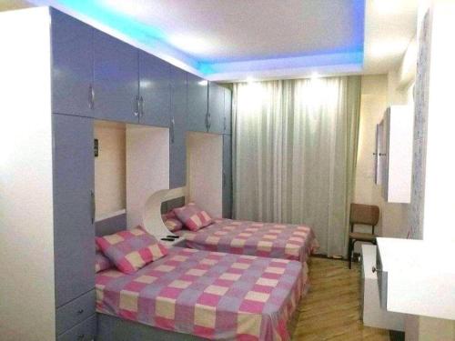 Postel nebo postele na pokoji v ubytování Cecelia Resort Hurghada