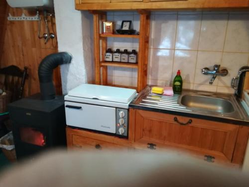 Kjøkken eller kjøkkenkrok på Apartmani FAMI Vlašić